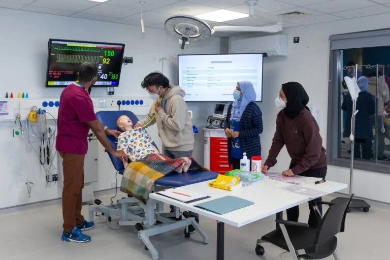 NUI Galway students learning in the Clinical Simulation and Interprofessional Education Facility health